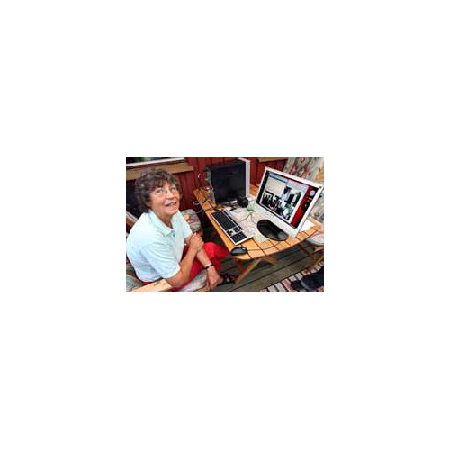 Une femme de 75 ans profite du Haut Débit à 40 Gbit/s